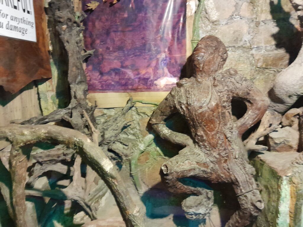 A carving of a young boy.