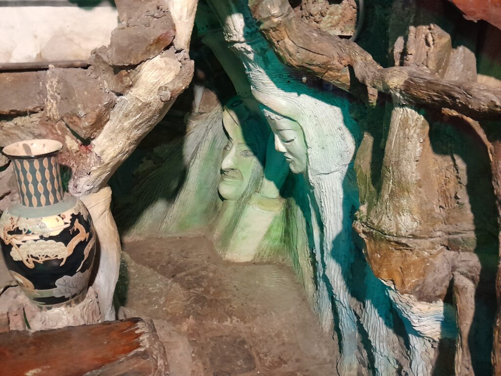 Faces carved into the walls.