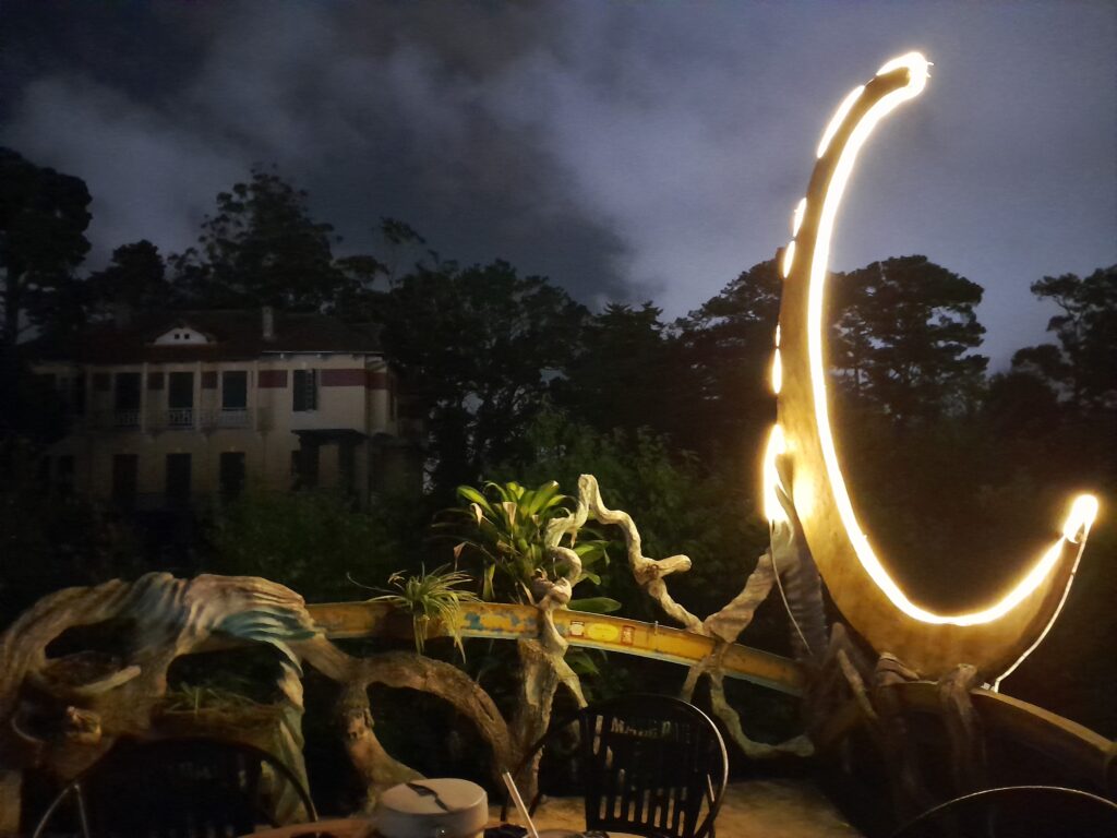 A crescent moon installation on one of the many roofs.
