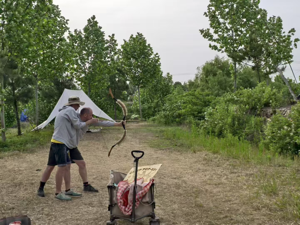 Practising archery at the Burn